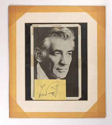 Lot 5172 - An inscribed photograph of a young Leonard Bernstein with his beloved Doberman