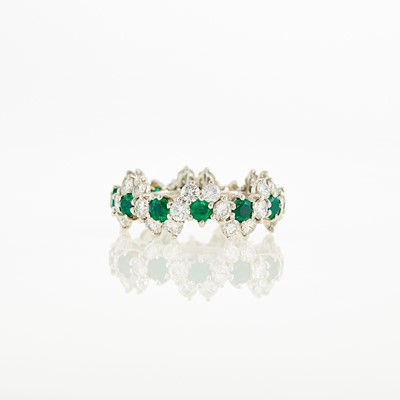 Lot 1160 - Platinum, Emerald and Diamond Band Ring