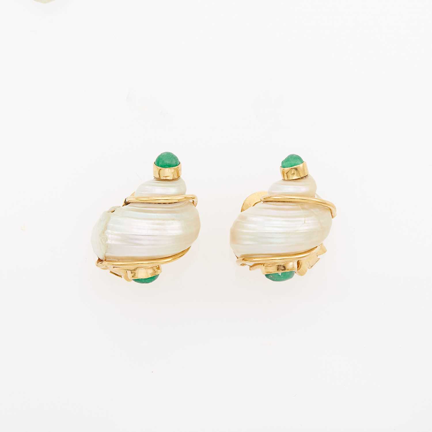Lot 1181 - Seaman Schepps Pair of Gold, Shell and Cabochon Emerald 'Turbo Shell' Earrings