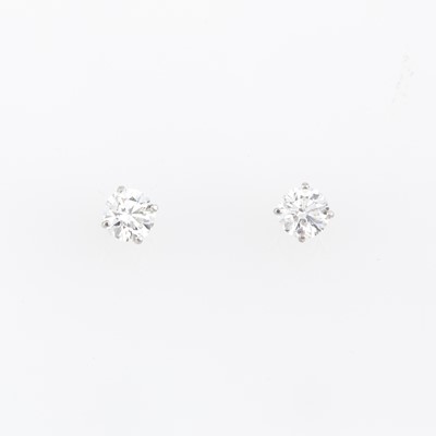 Lot 163 - Two Diamond Solitaire Earrings about 2.70 cts., 14K 1 dwt.