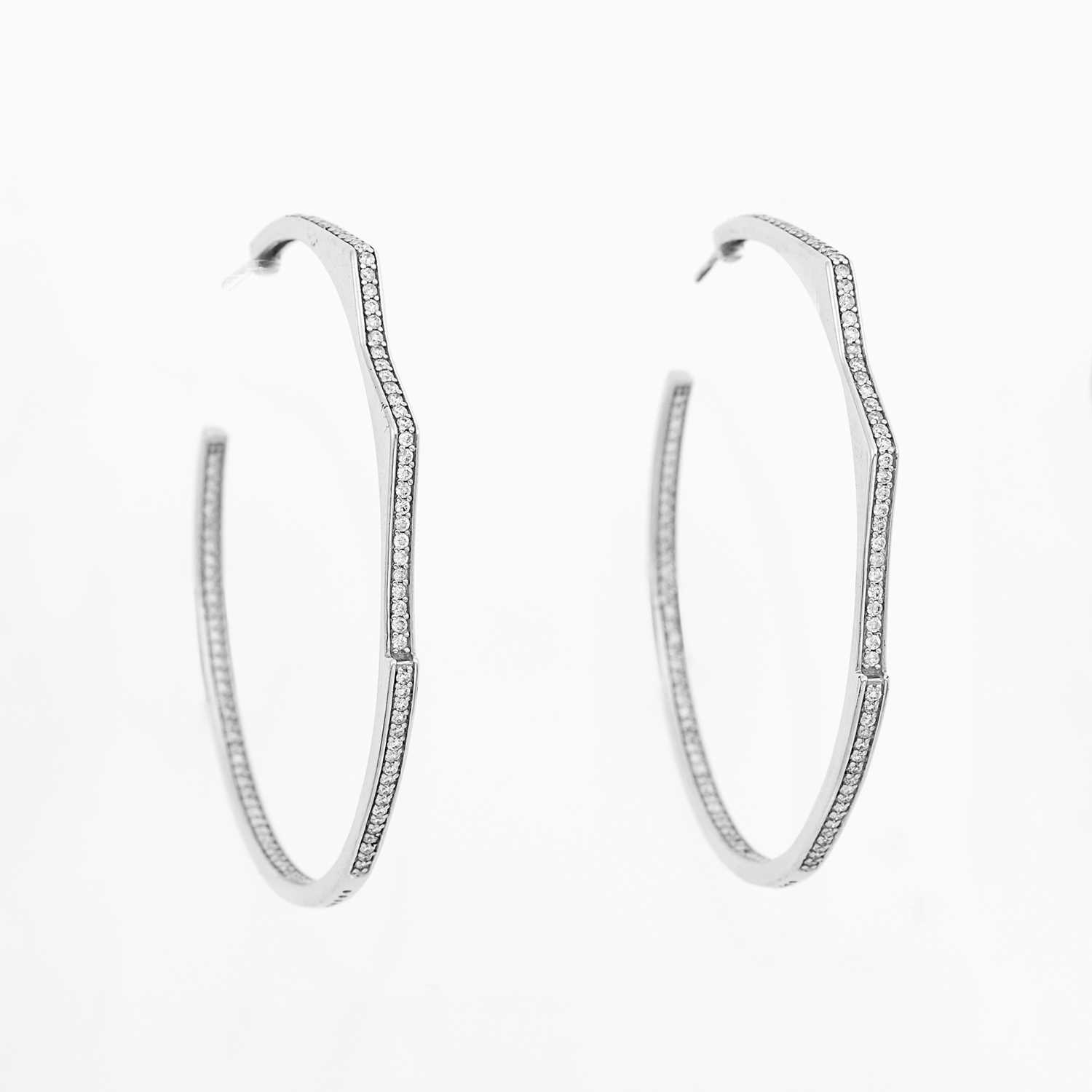 Lot 1061 - Lynn Ban Pair of Silver and Diamond Hoop Earrings