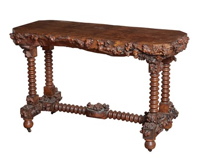 Lot 143 - Continental “Rustic” Oak and Other Woods Console Table