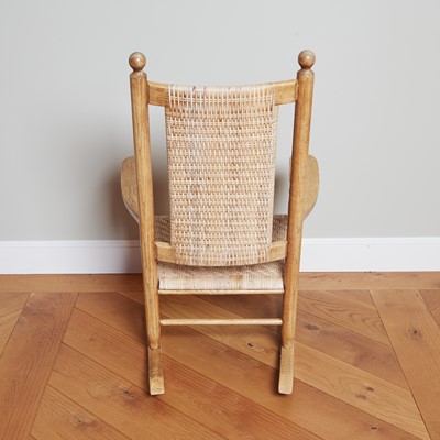 Lot 115 - Oak and Caned "Kennedy" Rocking Chair