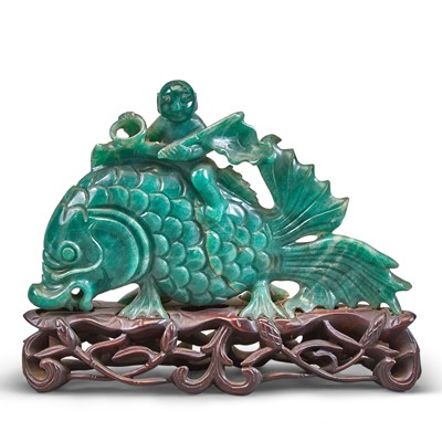 Lot 476a - A Chinese Green Hardstone Carving
