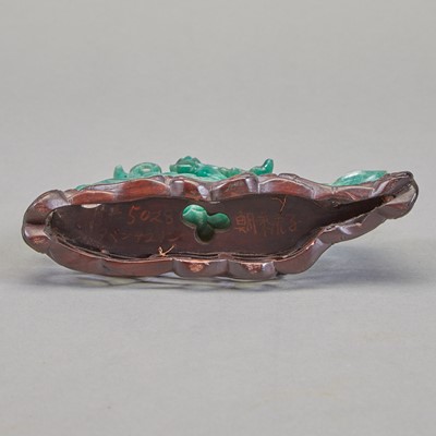 Lot 29 - A Chinese Green Hardstone Carving