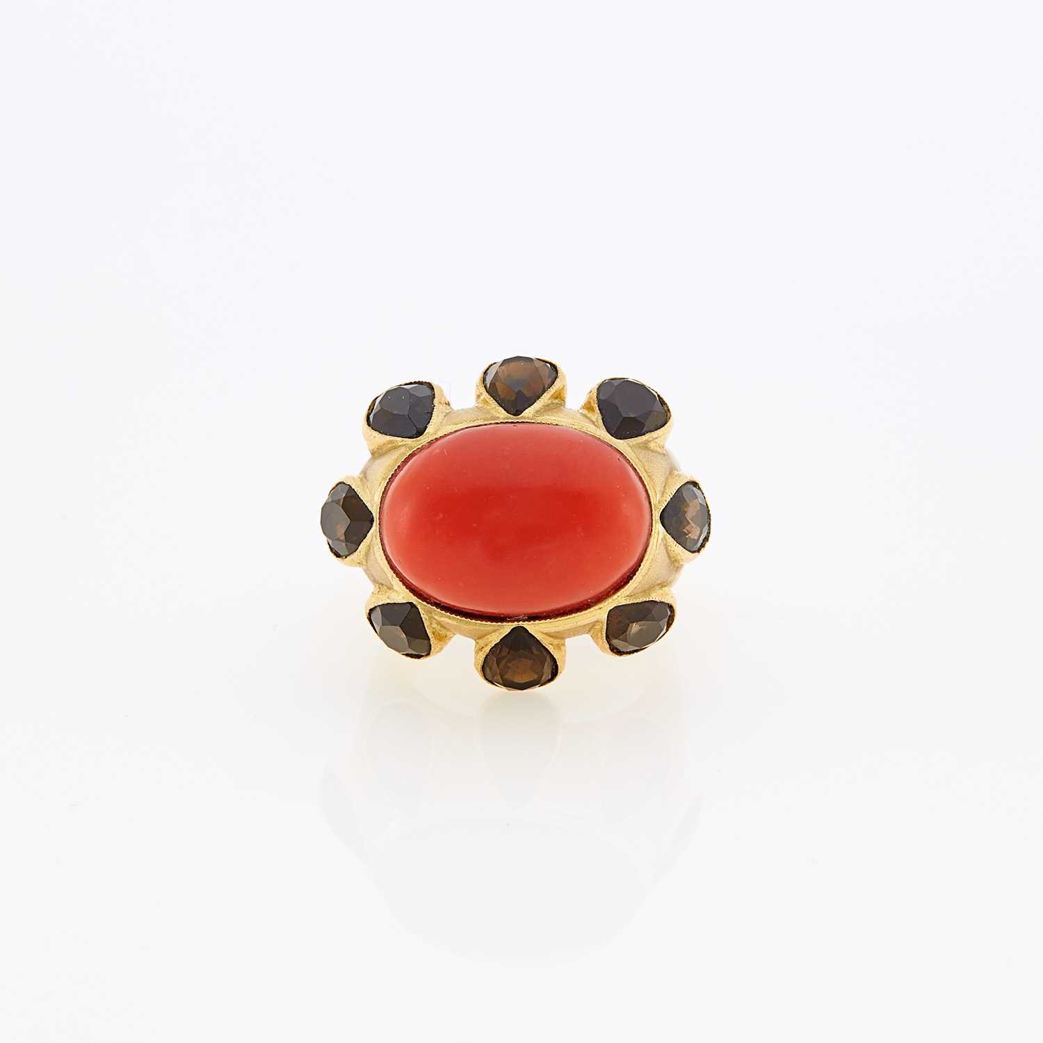 Lot 1192 - Gold, Cabochon Coral and Smoky Quartz Ring