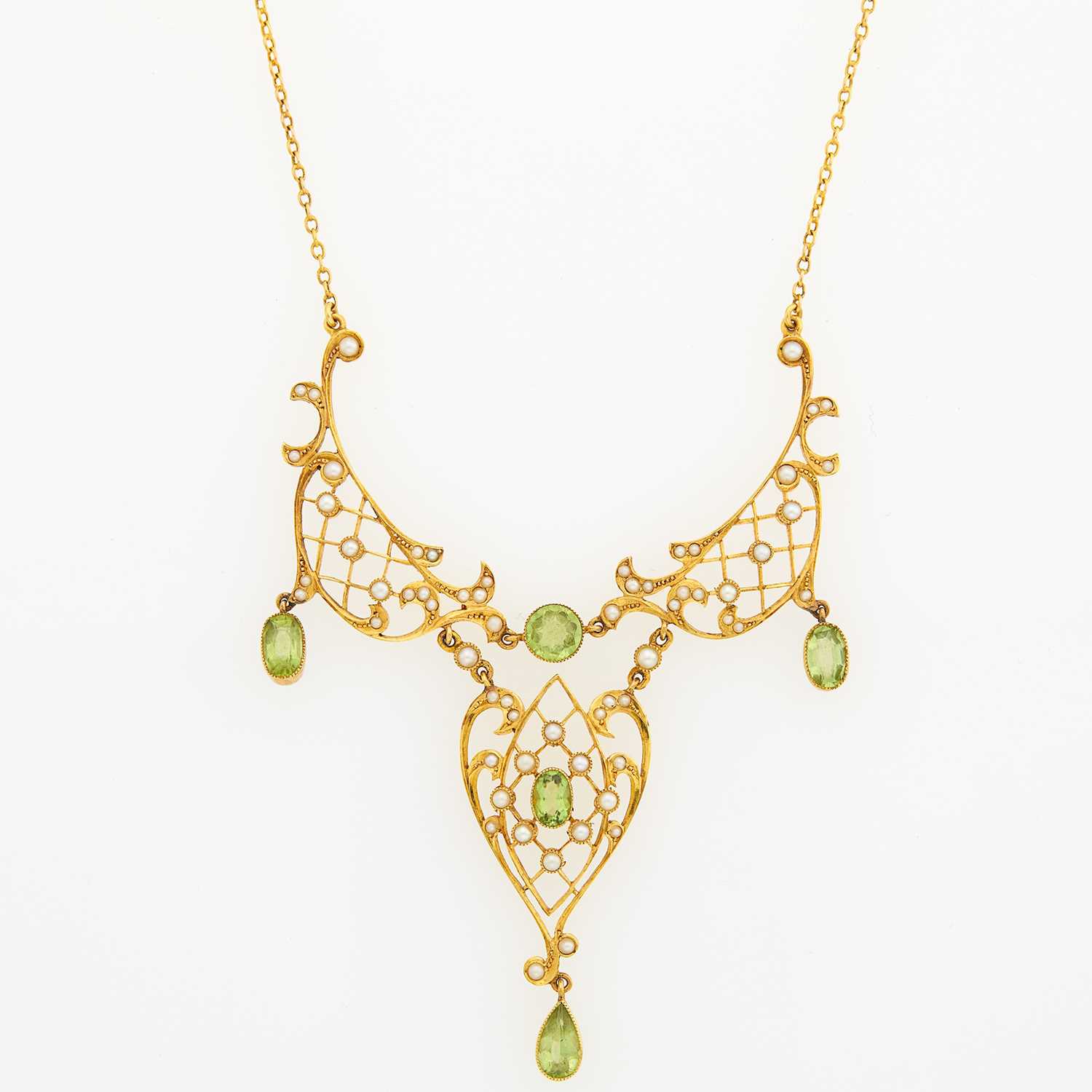 Lot 1138 - Gold, Peridot and Seed Pearl Pendant-Necklace