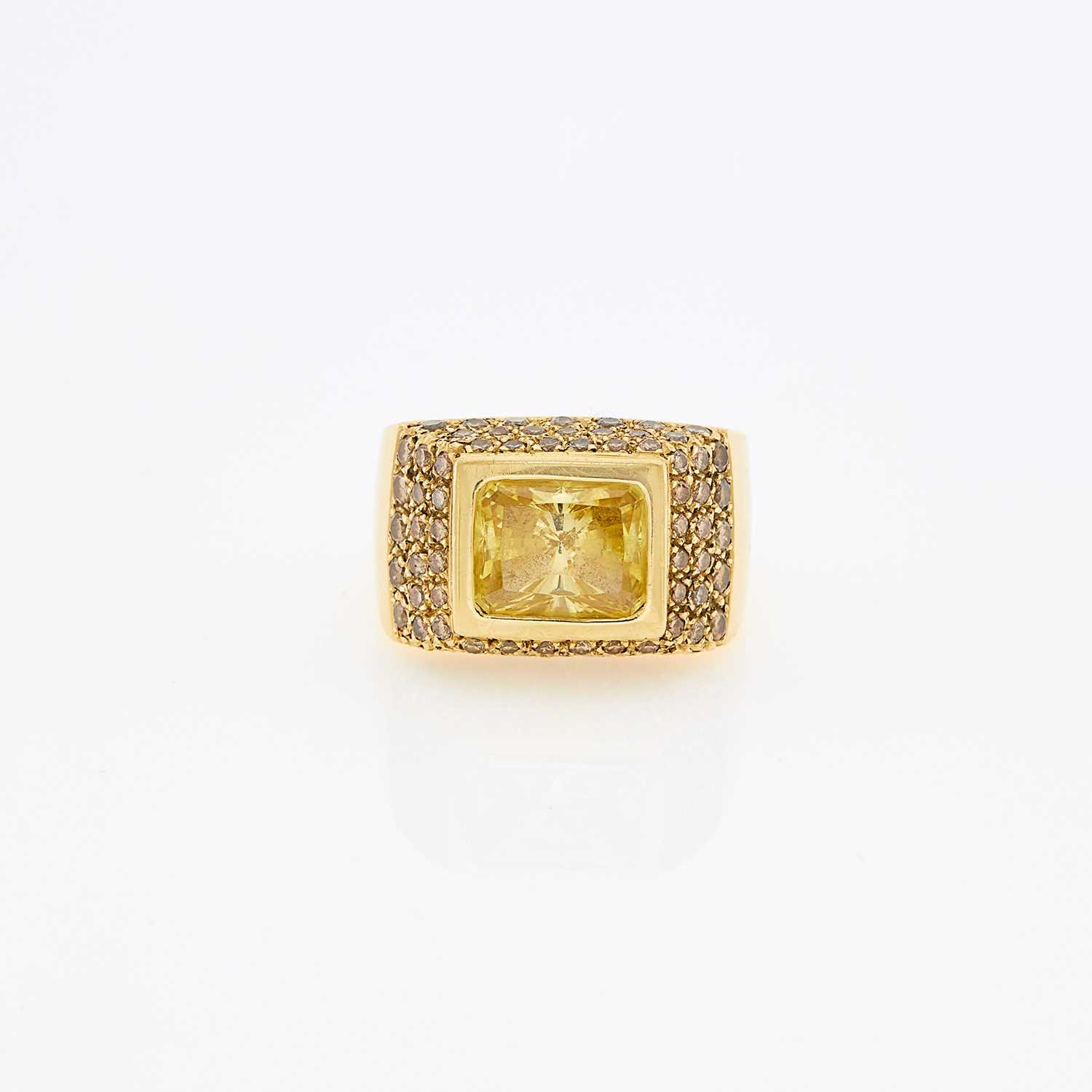 Lot 1117 - Gold, Yellow Cubic Zirconia and Colored Diamond Ring