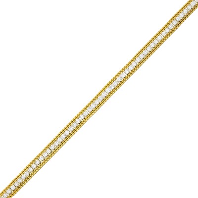 Lot 59 - Two-Color Gold and Diamond Bracelet