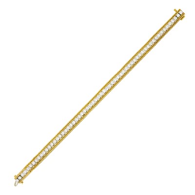 Lot 59 - Two-Color Gold and Diamond Bracelet