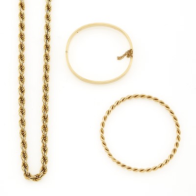 Lot 1259 - Gold Rope-Twist Necklace and Two Bangle Bracelets
