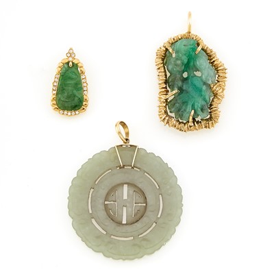 Lot 1106 - Three Gold, Carved Jade and Diamond Pendants