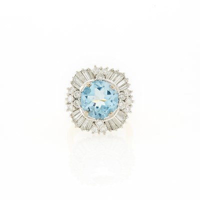 Lot 1211 - Two-Color Gold, Blue Topaz and Diamond Ballerina Ring
