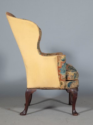 Lot 775 - George II Needlework-Upholstered Walnut and Beech Wing Armchair