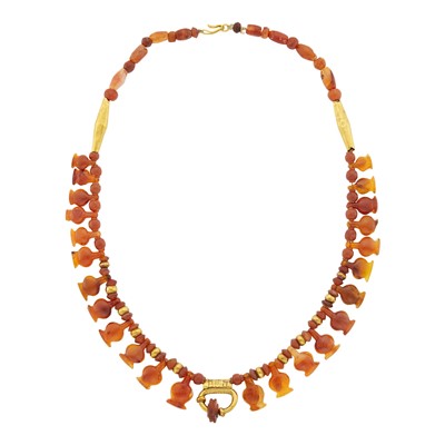 Lot 1068 - Ancient Carnelian Bead and Gold Necklace