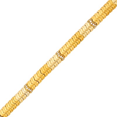 Lot 129 - Gold and Diamond Snake Link Bracelet