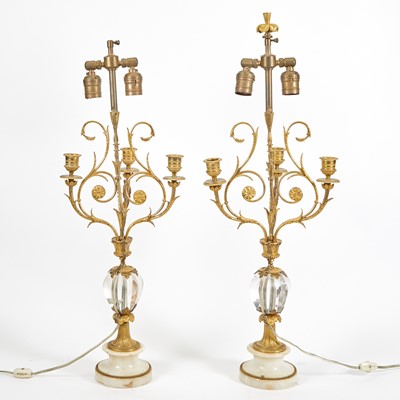 Lot 453 - Pair of Neoclassical Style Gilt-Bronze and Rock Crystal Three-Light Candelabra