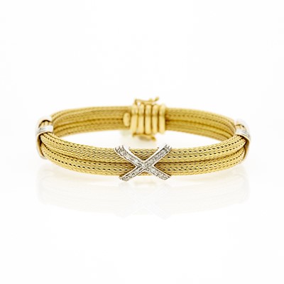 Lot 1030 - Two-Color Gold and Diamond 'X' Bangle Bracelet