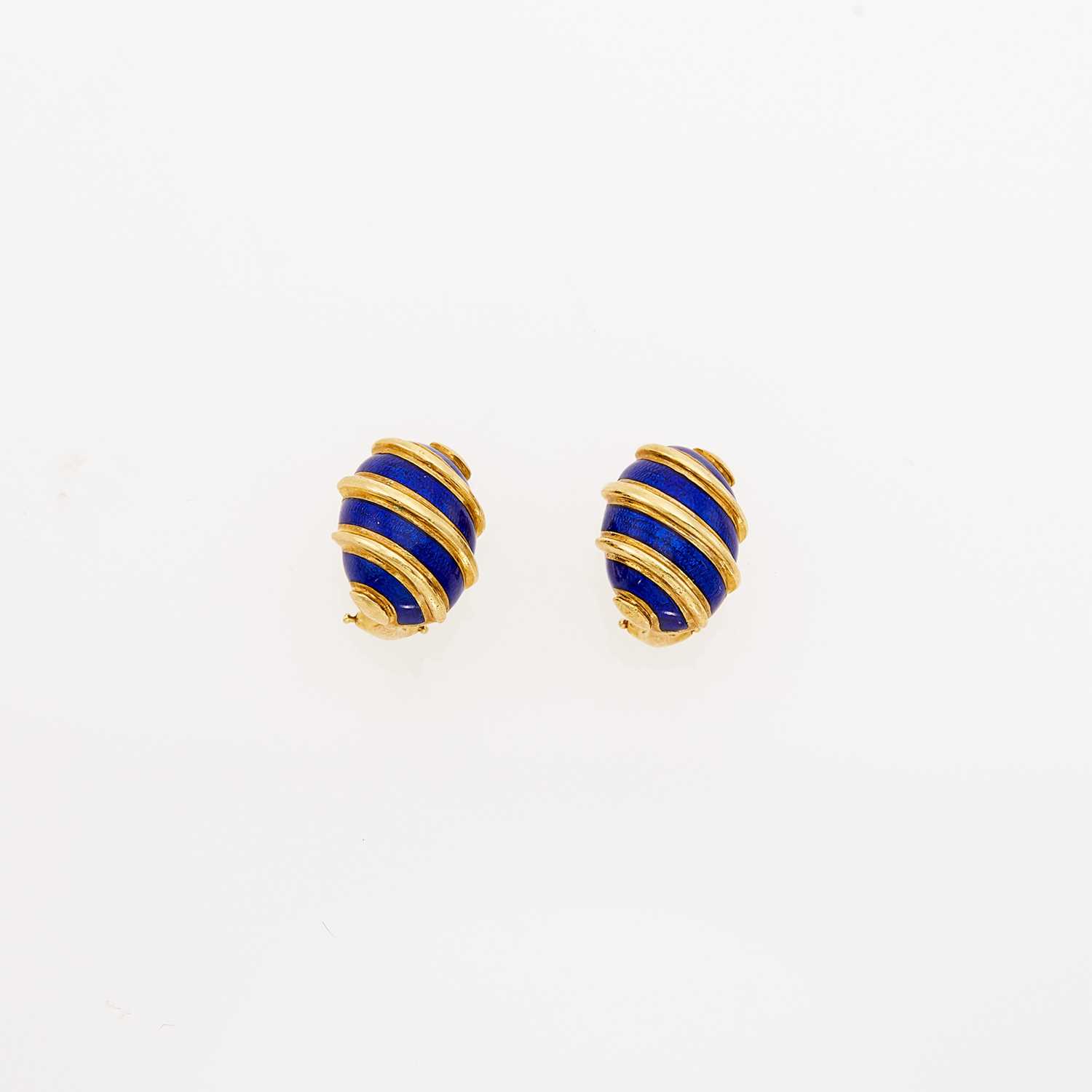 Lot 1018 - Tiffany & Co., Schlumberger Pair of Gold and Blue Enamel Bombé Earclips