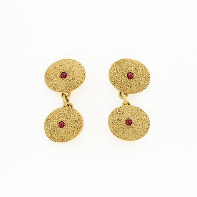 Lot 1255 - Pair of Gold and Cabochon Ruby Cufflinks