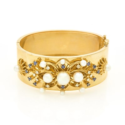 Lot 1148 - Gold, Cultured Pearl, Diamond and Sapphire Bangle Bracelet