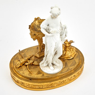 Lot 265 - Continental Gilt-Bronze and Bisque Porcelain Figure