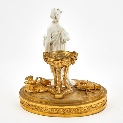 Lot 265 - Continental Gilt-Bronze and Bisque Porcelain Figure