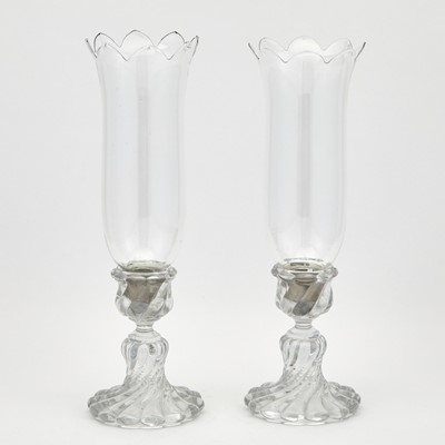 Lot 63 - Pair of Baccarat Blown and Molded Glass Candlesticks With Chimneys