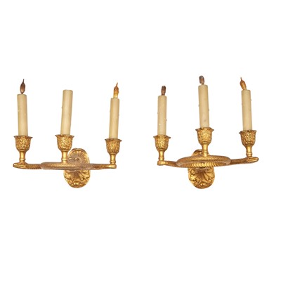 Lot 743 - Set of Four Louis XVI Style  Gilt Bronze Three-Light Wall Lights