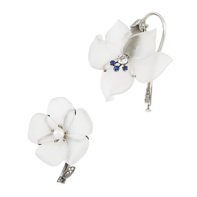 Lot 2240 - Pair of White Gold, Carved Rock Crystal, Cultured Pearl, Sapphire and Diamond Flower Brooches