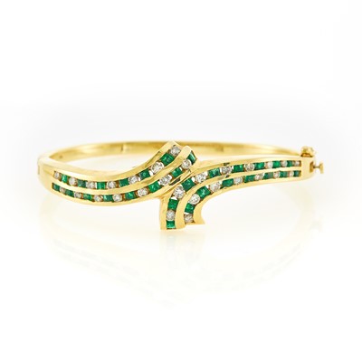 Lot 1238 - Gold, Diamond and Emerald Bangle Bracelet