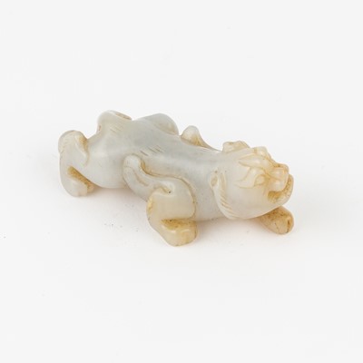 Lot 21 - A Chinese Celadon Jade Carving of a Beast