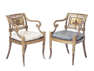 Lot 179 - Pair of Regency Painted and Giltwood Caned Seat Open Armchairs