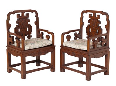 Lot 557 - A Pair of Chinese Hardwood Armchairs