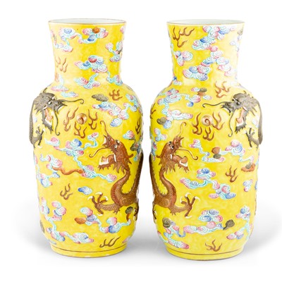 Lot 257 - A Pair of Enameled Yellow-Ground Porcelain Dragon Vases