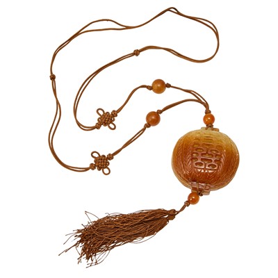 Lot 455 - A Small Chinese Russet Jade Sachet