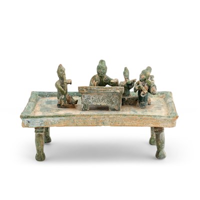 Lot 720 - A Chinese Green Glazed Pottery Stand with Musicians