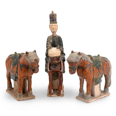 Lot 612 - A Chinese Glazed Pottery Equestrian with a Pair of Horses