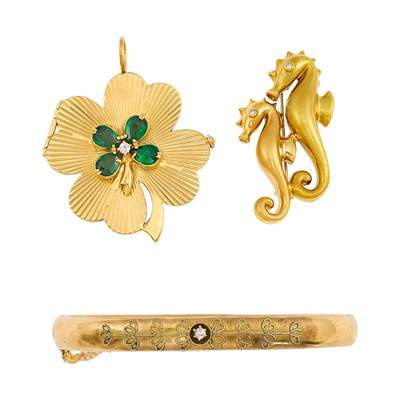 Lot 2279 - Gold Clover Locket Charm, Two-Color Gold Seahorse Brooch and Antique Gold-Filled Bangle Bracelet