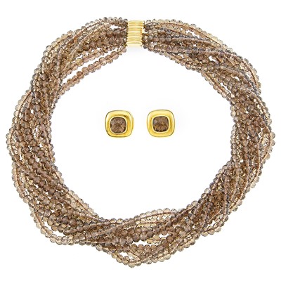 Lot 2175 - Gold and Smoky Quartz Torsade Necklace and Pair of Ruth Taubman Earclips