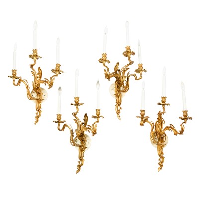 Lot 317 - Set of Four Louis XV Style Gilt-Bronze Three-Light Sconces