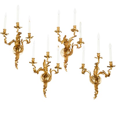 Lot 319 - Set of Four Louis XV Style Gilt-Bronze Three-Light Sconces