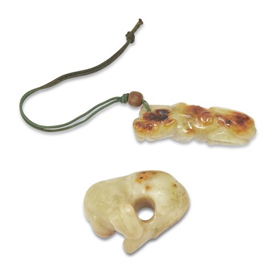 Lot 18 - Two Chinese Russet Jade Pendants