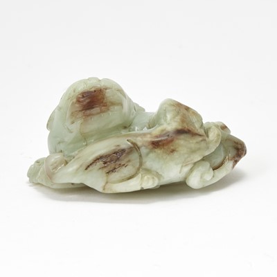 Lot 31 - A Chinese Celadon Jade 'Lion and Cub' Carving
