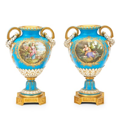 Lot 325 - Pair of Sèvres Style Gilt-Metal Mounted Turquoise Ground Porcelain Two-Handled Vases