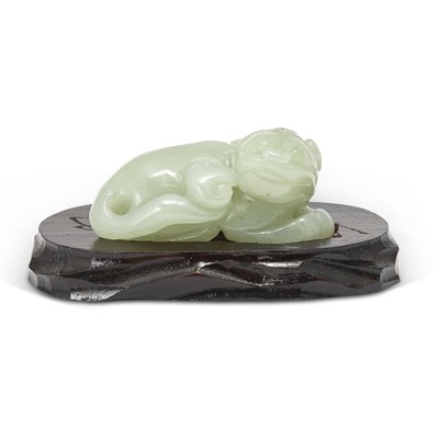 Lot 467 - A Chinese Celadon White Jade Carving