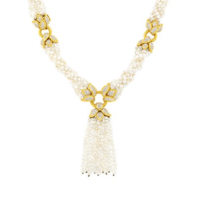 Lot 1113 - Twisted Seven Strand Baroque Freshwater Pearl, Two-Color Gold and Diamond Tassel Necklace