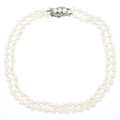 Lot 2215 - Double Strand Cultured Pearl Necklace with Low Karat White Gold and Diamond Clasp