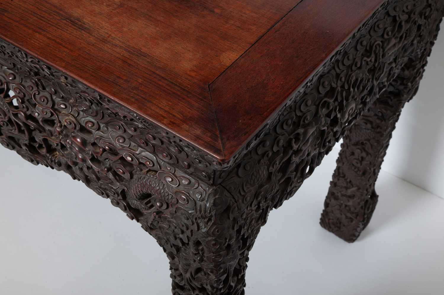 Lot 610 - A Chinese Carved Hardwood Table