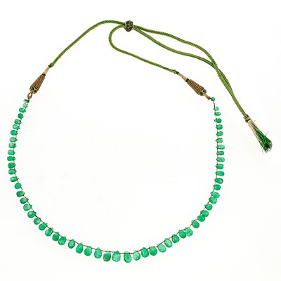 Lot 1113 - Emerald Bead Necklace with Cord